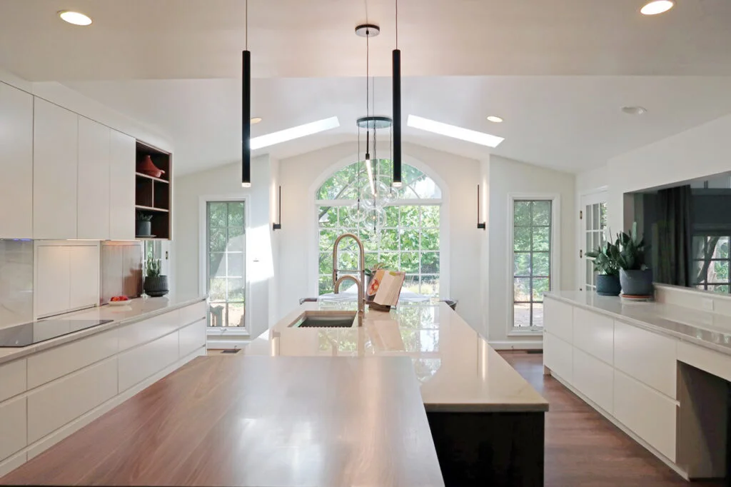 Custom kitchen remodel with shaker cabinetry and quartz counters by Excell Homes